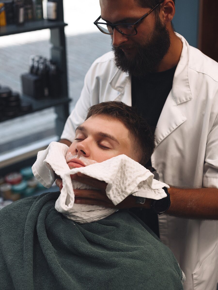 Hot towel wrap before a shave